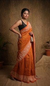 Premium Rust Orange Woven Saree with Majestic Silver Border | Mrs. SARDARNI